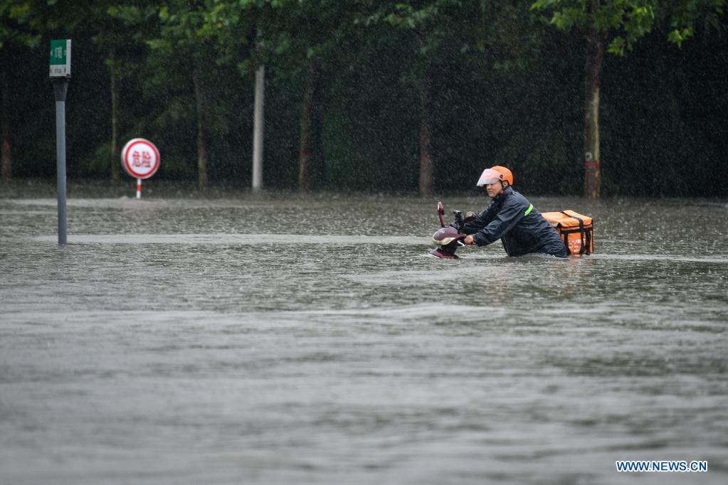 Record rains hit Henan, C China
