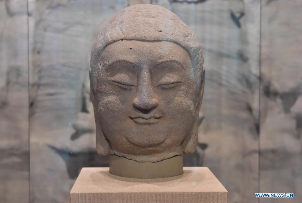 Lost Buddha statue returns to China's relic-rich province