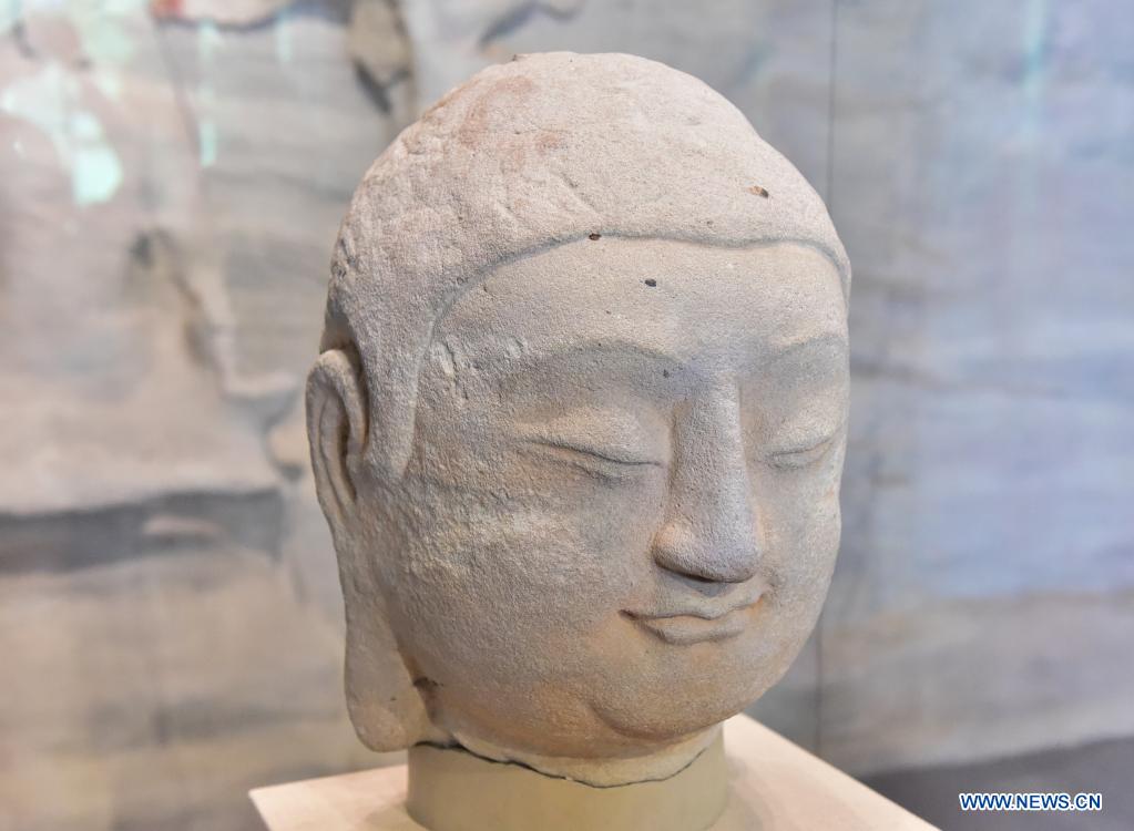 Lost Buddha statue returns to China's relic-rich province