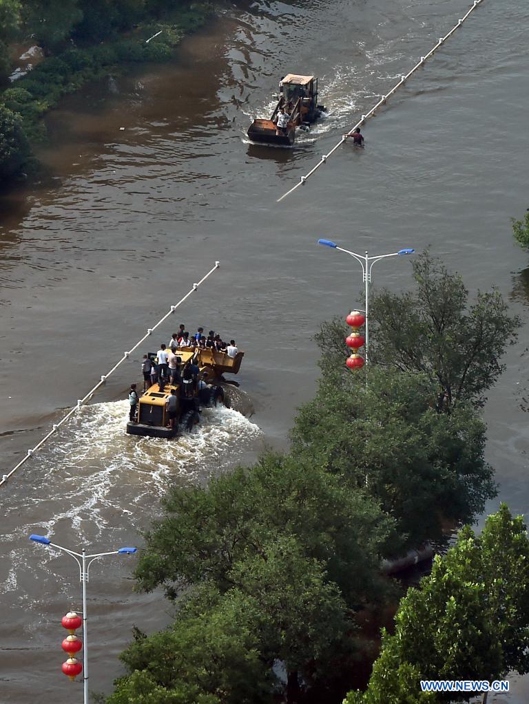 Stranded residents evacuated in flood-hit Henan