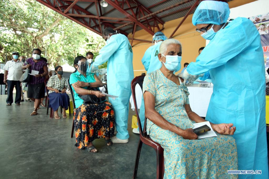 People receive COVID-19 vaccines in Sri Lanka