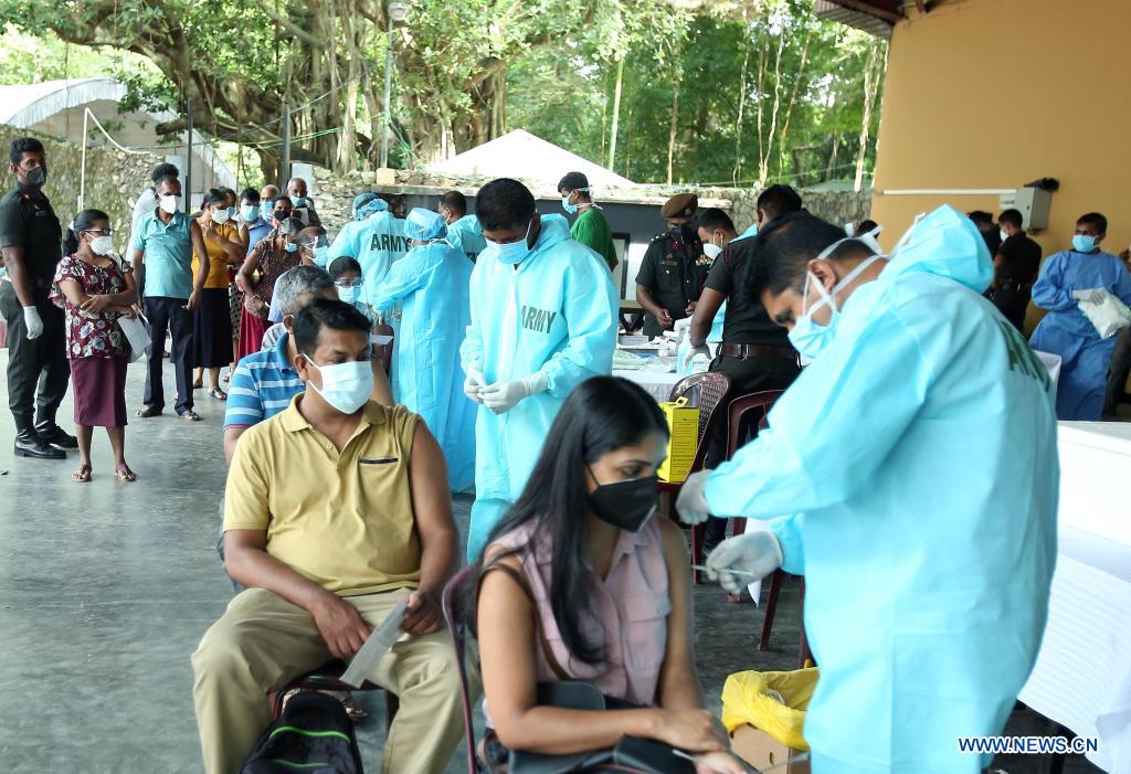 People receive COVID-19 vaccines in Sri Lanka