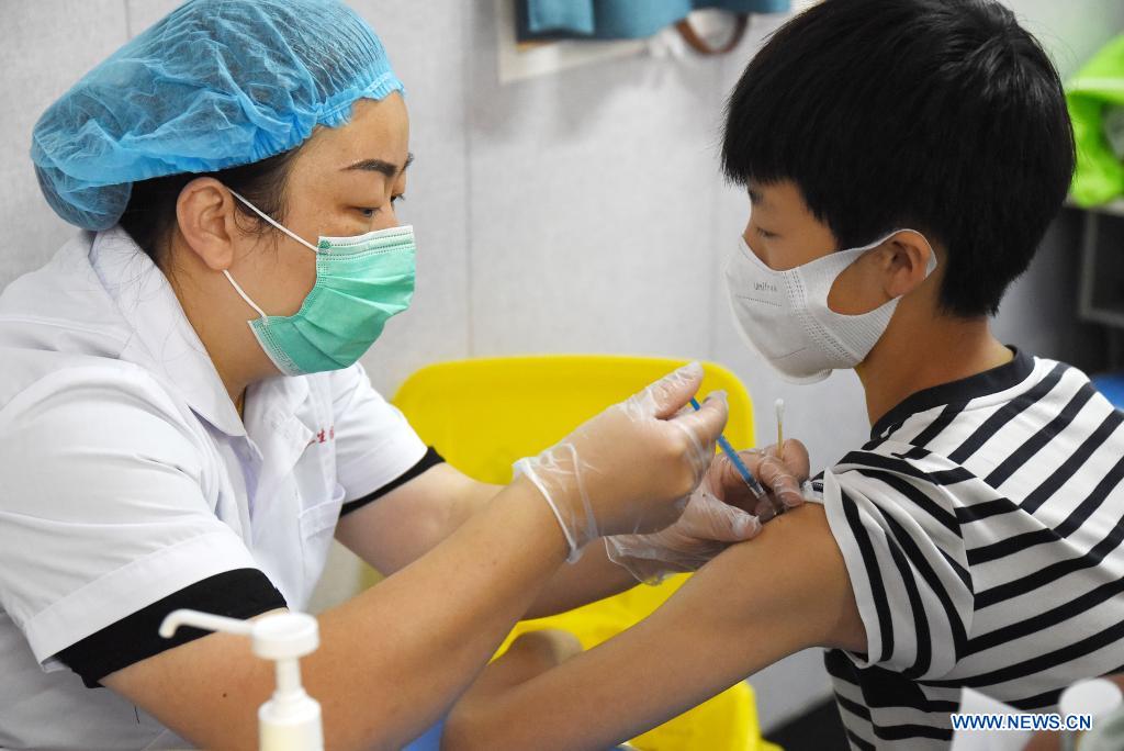 Minors receive COVID-19 vaccine in Handan, north China