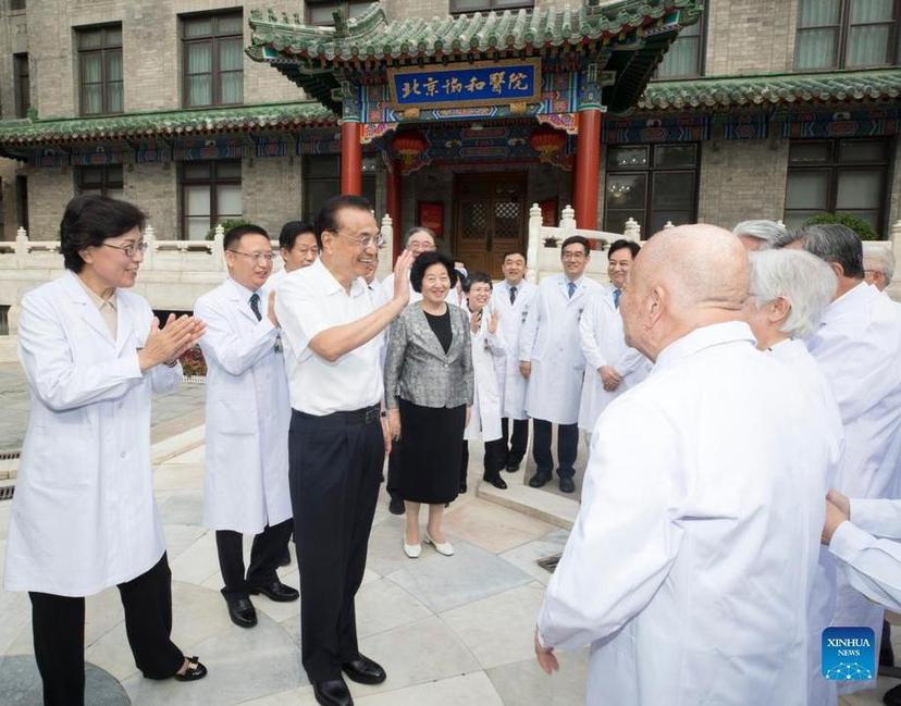 Chinese premier stresses efforts to safeguard people's health