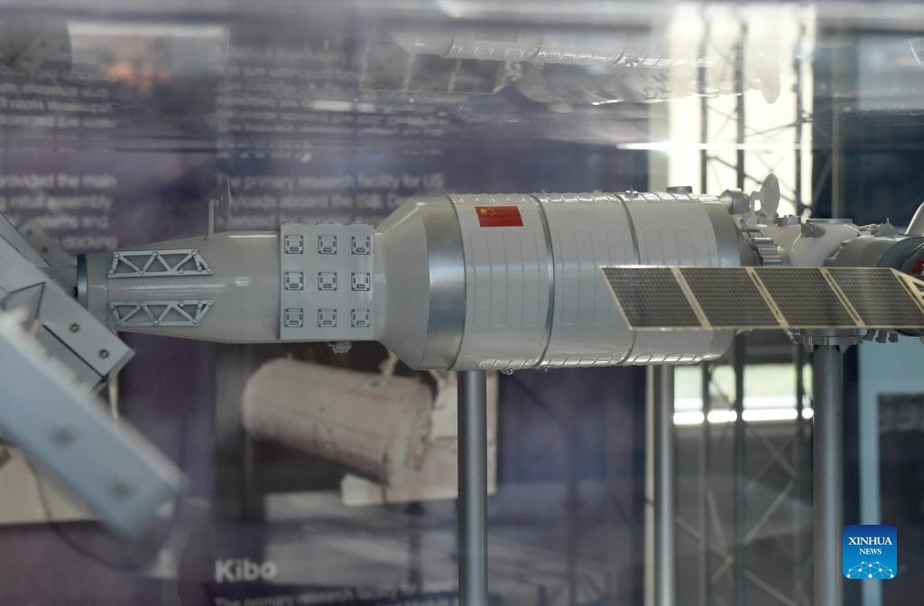 Models of China's space station and lunar rover Yutu displayed in Vienna