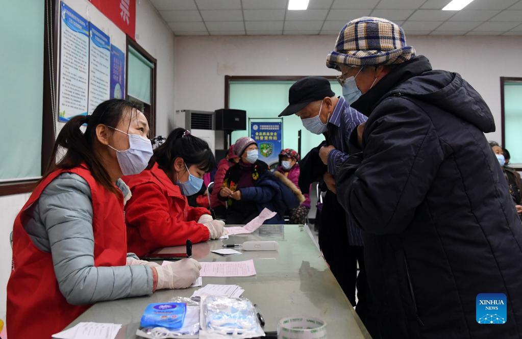 Local residents receive booster shot of COVID-19 vaccine in Beijing