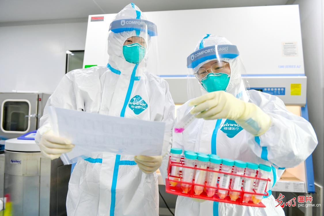 PCR tests run against the clock in SE China’s Zhejiang