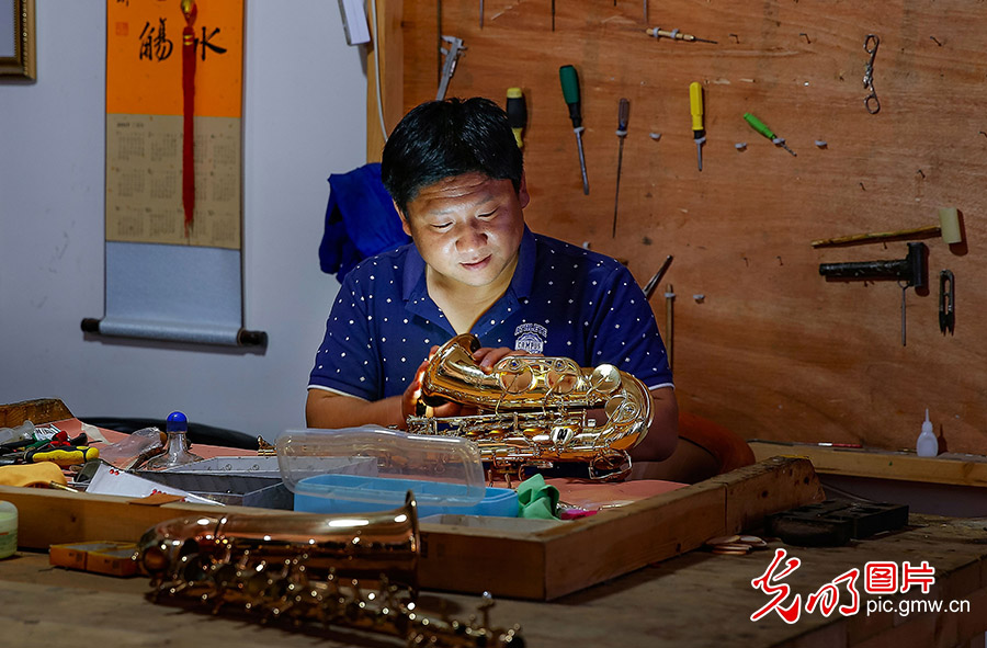 Zhouwo Village: How its pillar industry transformed from agriculture to music instrument