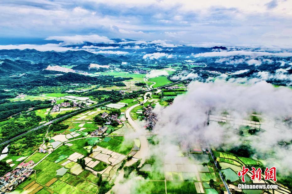 Picturesque scenery of cloud-enveloped village after rain in E China’s Jiangxi Province