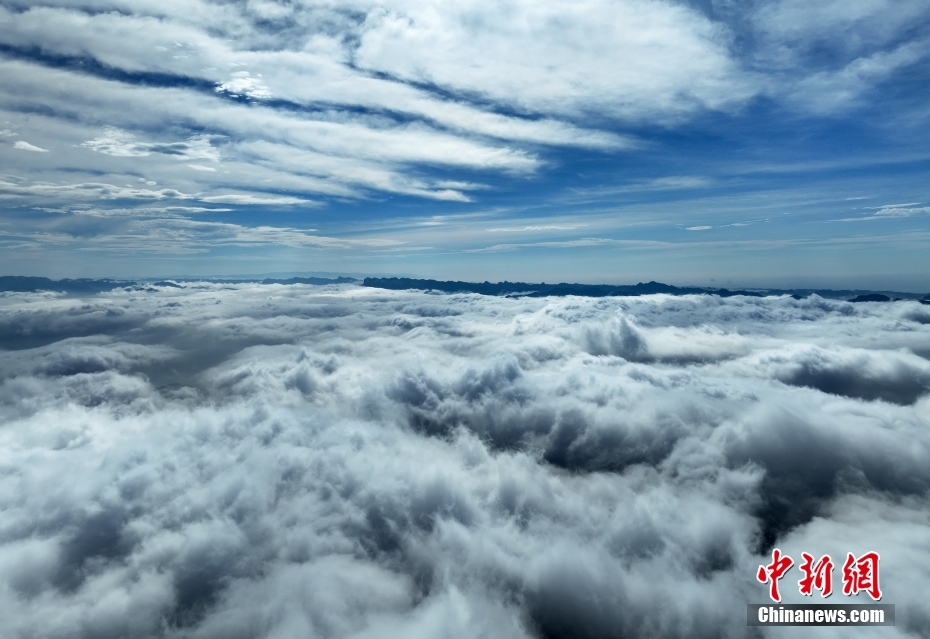Scenery of cloud-enveloped Three Gorges Dam in C China’s Hubei Province