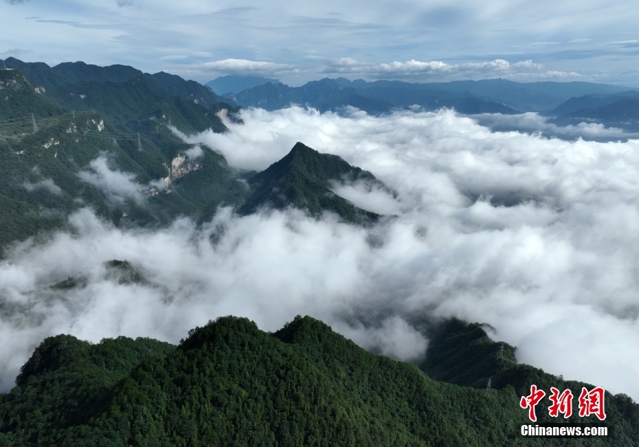 Scenery of cloud-enveloped Three Gorges Dam in C China’s Hubei Province