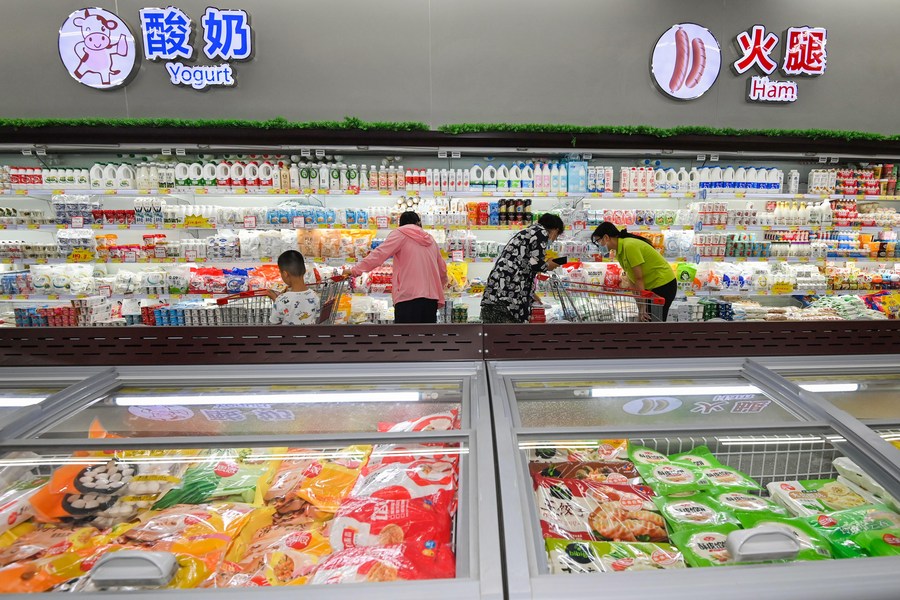 China's consumer prices increase mildly, factory inflation eases