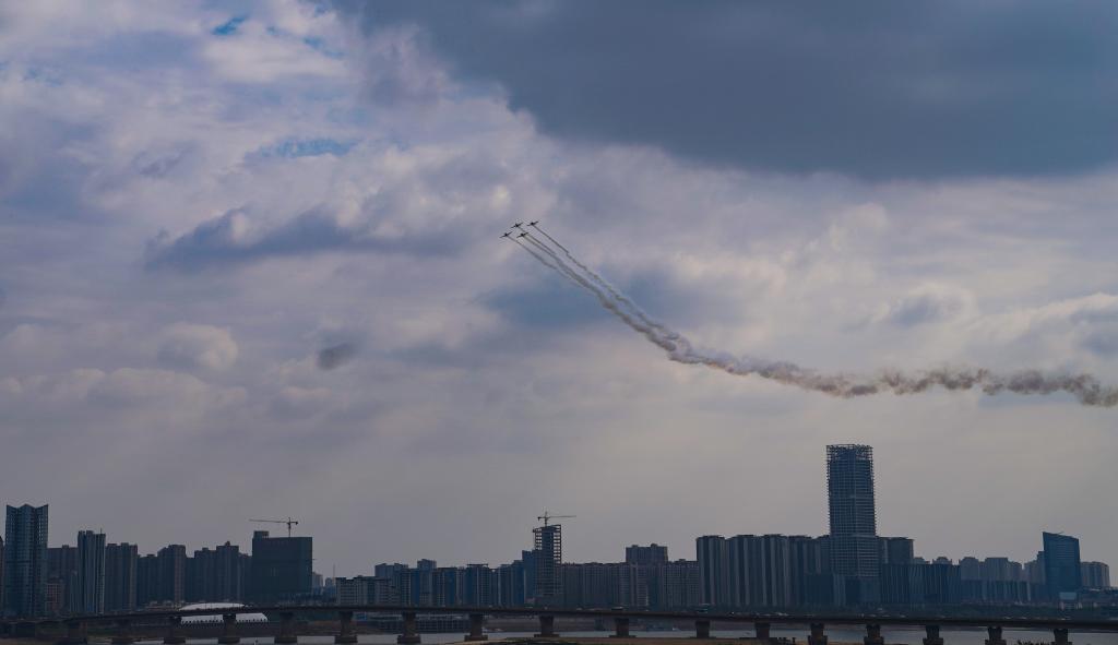 Aircrafts from South African aerobatics team perform above downtown Nanchang in E China