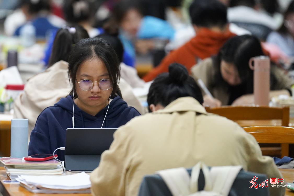 Students working hard to prepare for national postgraduate entrance exam