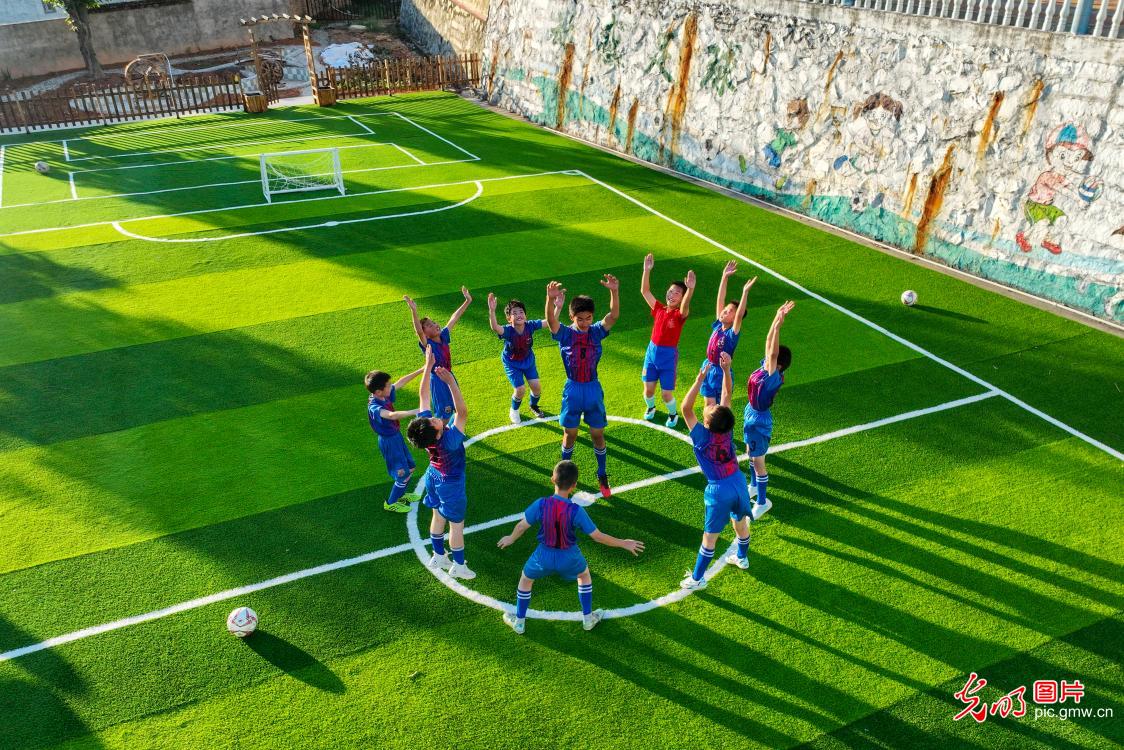 Children enjoy football games in southeast China's Fujian Province