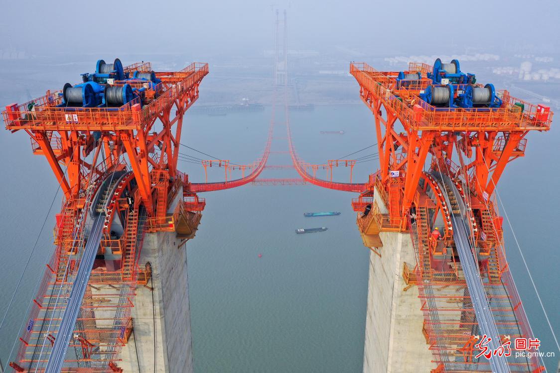 Xianxin Yangtze River Bridge under construction in E China's Jiangsu
