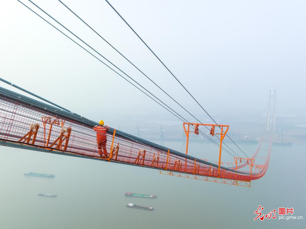 Xianxin Yangtze River Bridge under construction in E China's Jiangsu