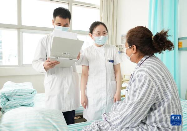 Pic Story: A nurse in white gown