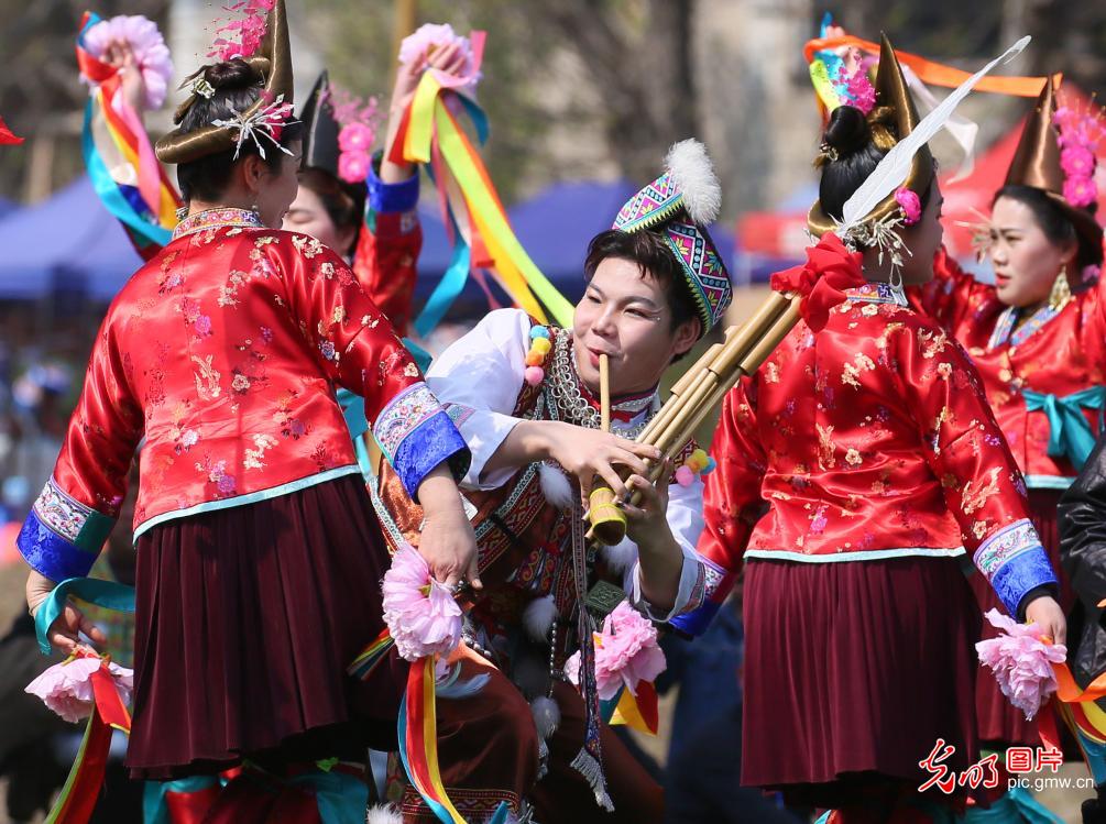 People celebrate traditional festival with dance and music in S China's Guangxi