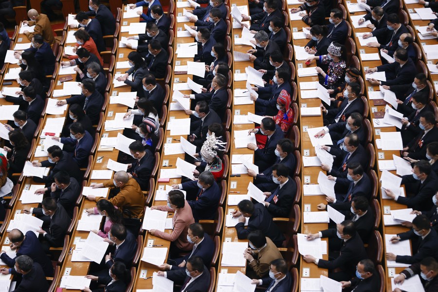 Xinhua Headlines: Observing China's whole-process people's democracy at 