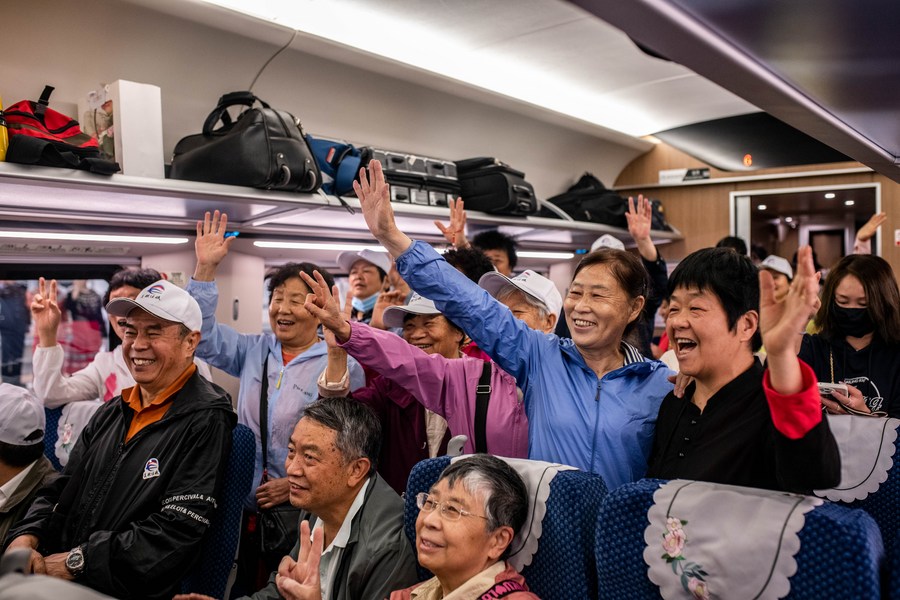 Xinhua Headlines: China-Laos Railway starts cross-border passenger services