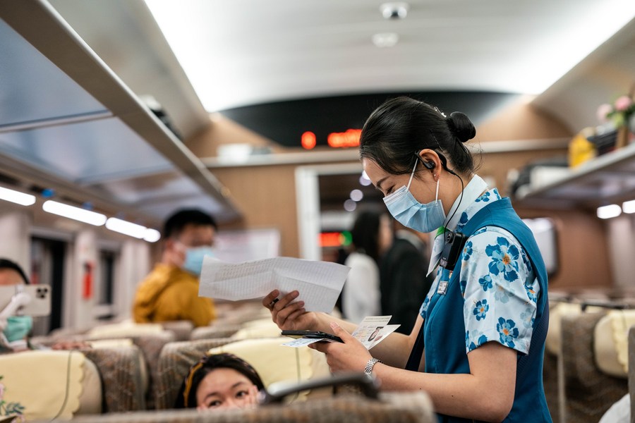 Xinhua Headlines: China-Laos Railway starts cross-border passenger services