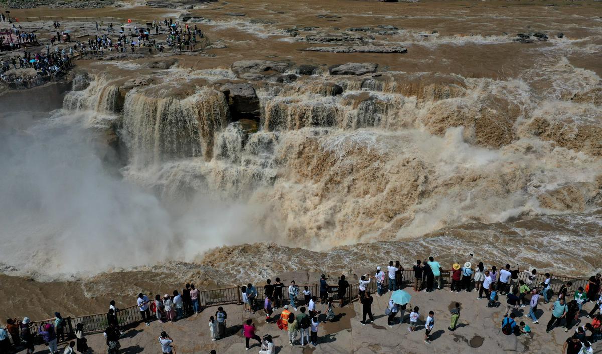 Hukou Waterfall transformed by heavy rains