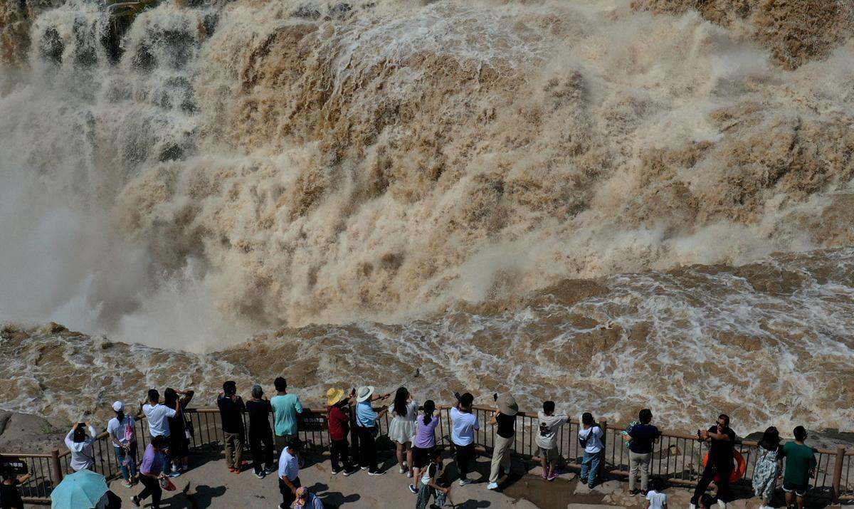 Hukou Waterfall transformed by heavy rains