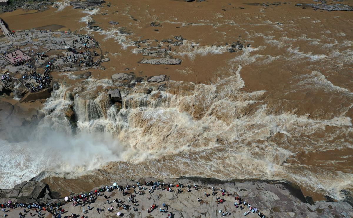 Hukou Waterfall transformed by heavy rains