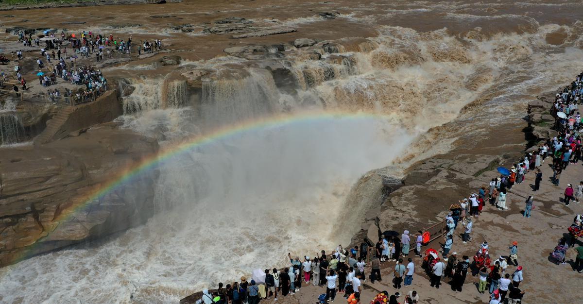 Hukou Waterfall transformed by heavy rains