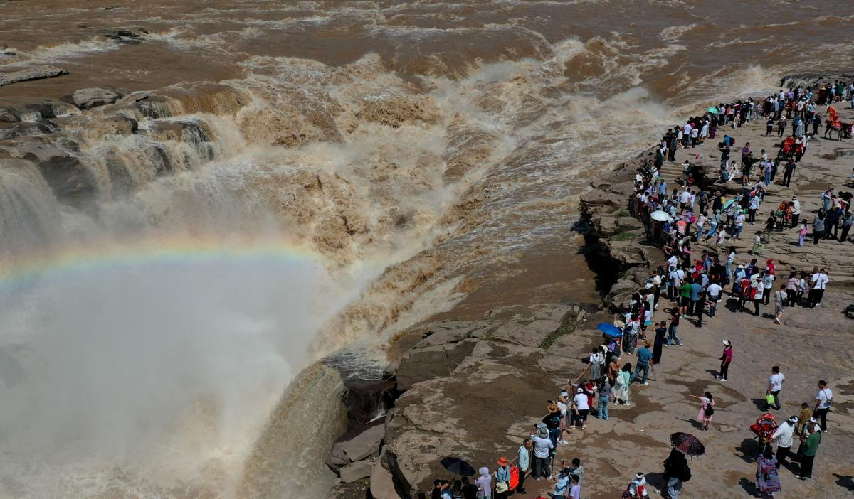 Hukou Waterfall transformed by heavy rains