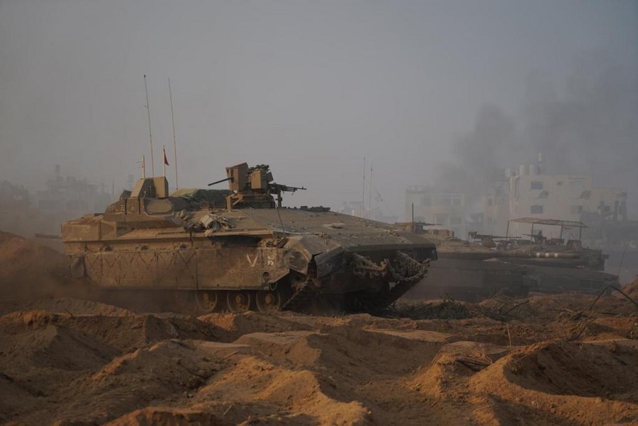 One month into conflict, Israeli troops reach 