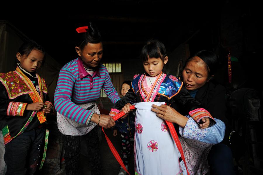 InPics: Relocation helps girl once living in mountainous area embrace new life