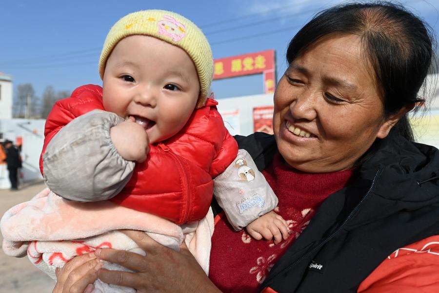 FOCUS | People bustle on the first day of 2024 in relocation sites of NW China's Gansu, Qinghai