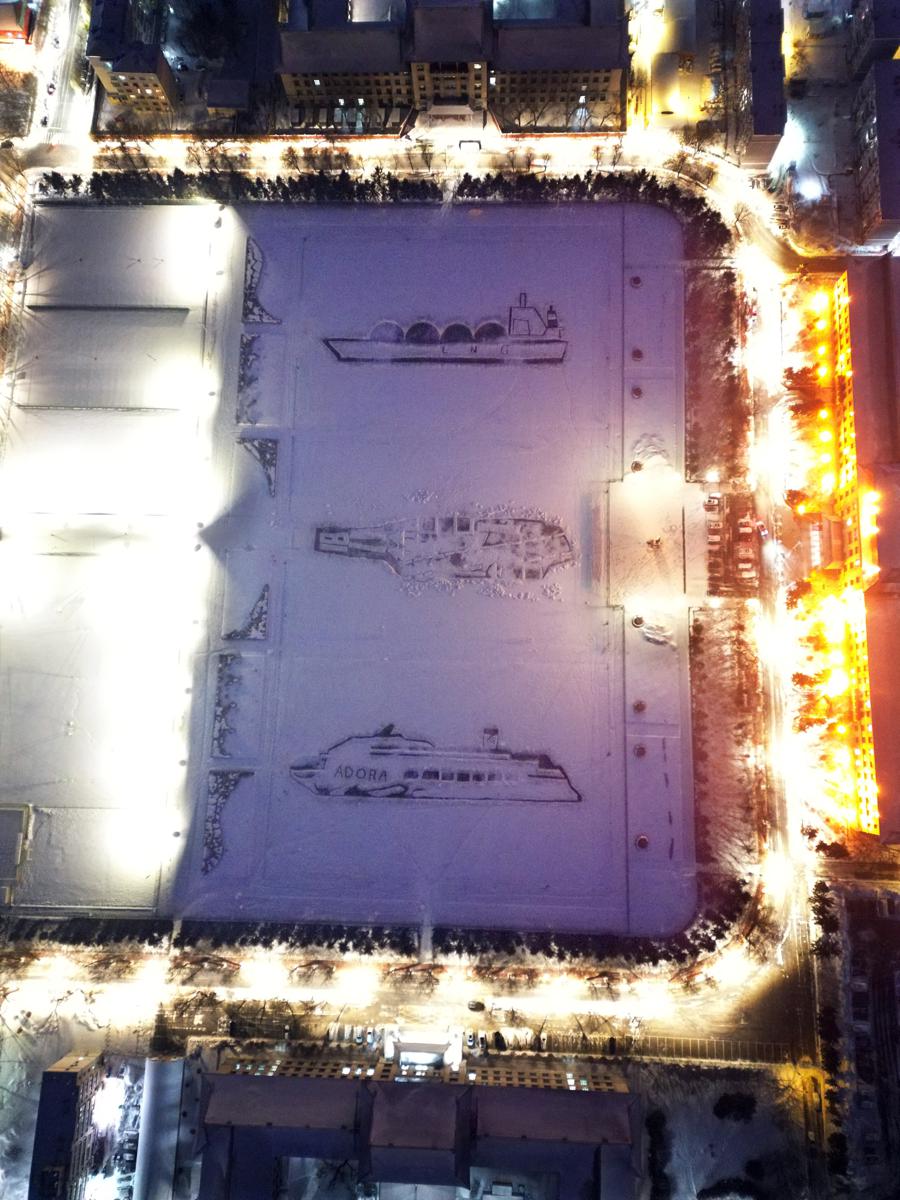 Harbin Engineering University students create massive snow sketches to welcome the new year