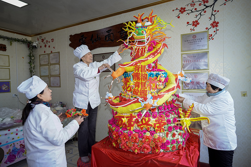 Loong-shaped dough sculpture ready for Chinese New Year