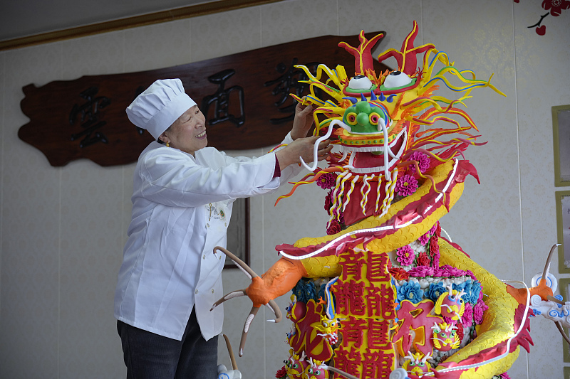 Loong-shaped dough sculpture ready for Chinese New Year