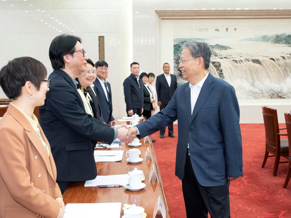 Top legislator urges NPC deputies to contribute to Chinese modernization