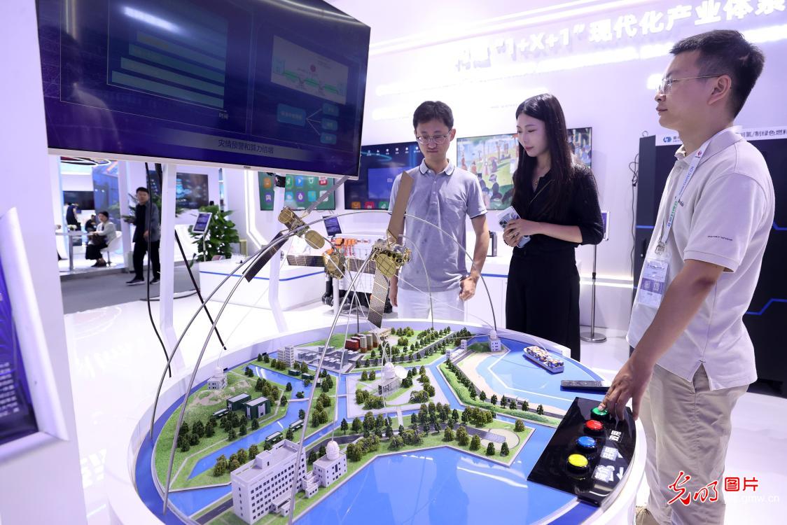 Visitors enjoy innovations at the 26th China Beijing International High-tech Expo