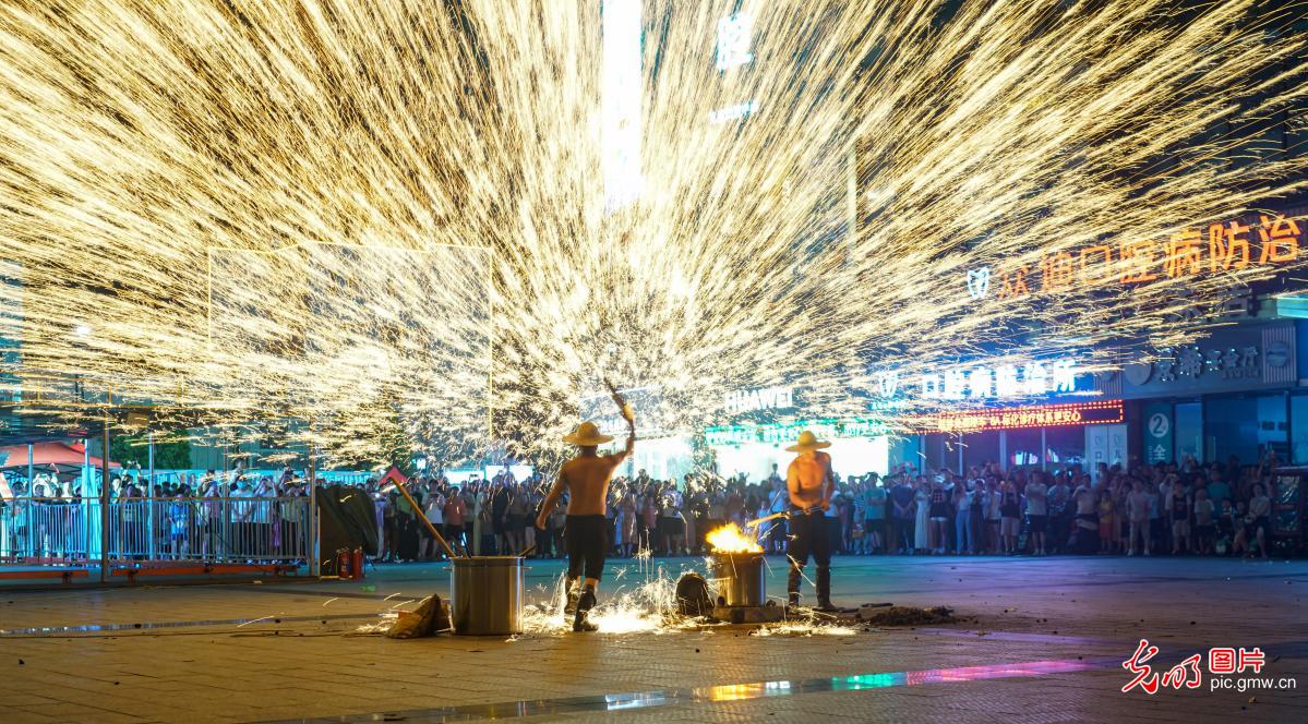 Iron flower performance lights up summer night sky in E China's Jiangsu