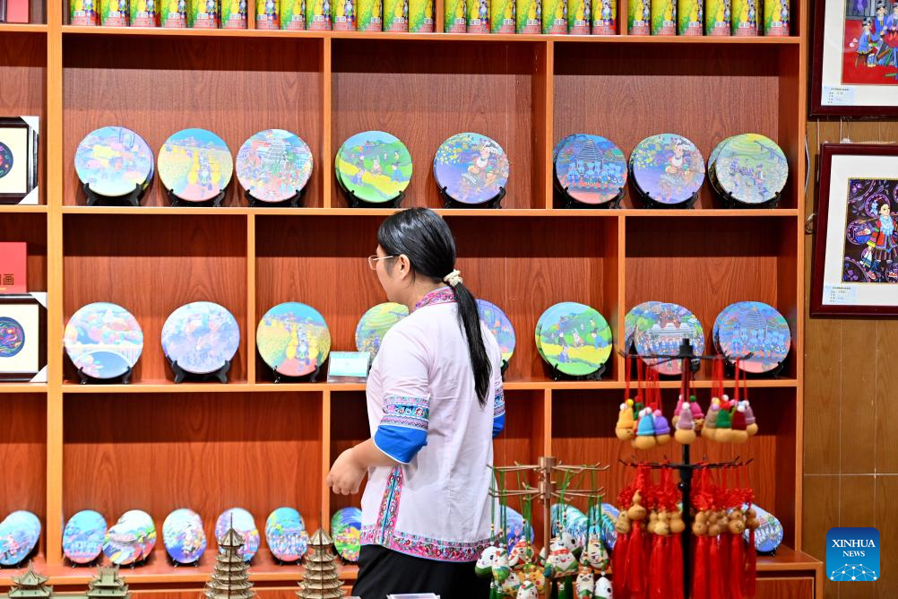 In pics: Sanjiang farmer painting in S China's Guangxi