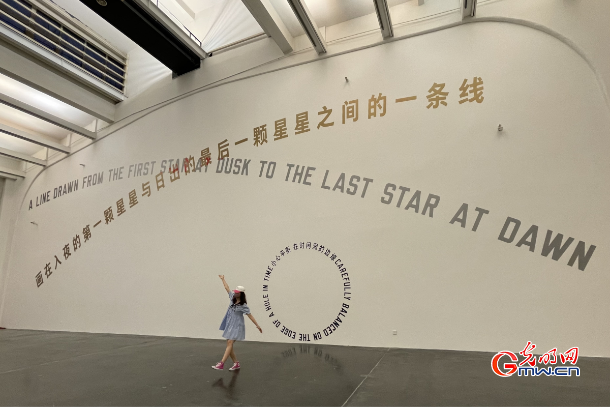 People visiting exhibition themed with pursuit of happiness on Chinese Valentine's Day