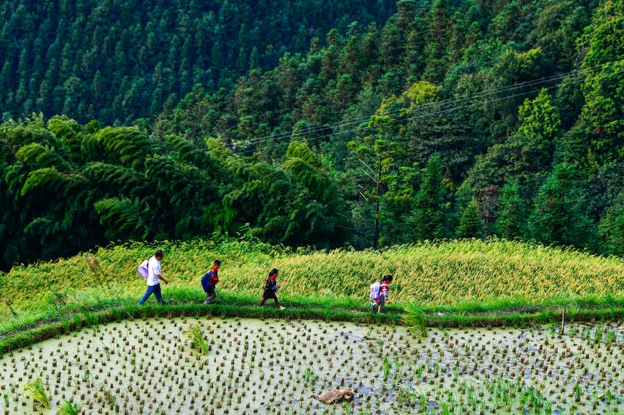 Teacher delivers hope to children in China's landlocked mountains