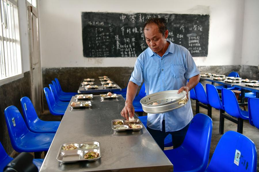 Teacher delivers hope to children in China's landlocked mountains