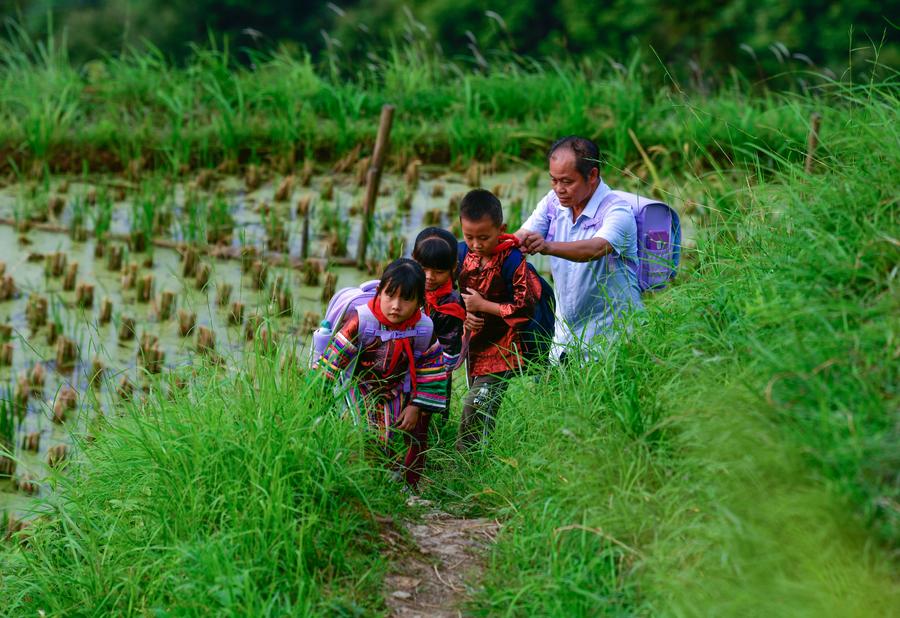 Teacher delivers hope to children in China's landlocked mountains