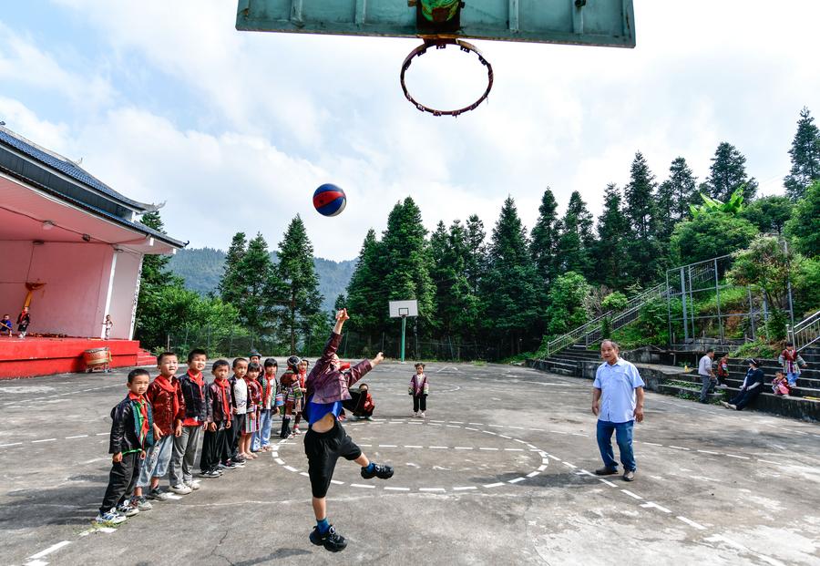 Teacher delivers hope to children in China's landlocked mountains