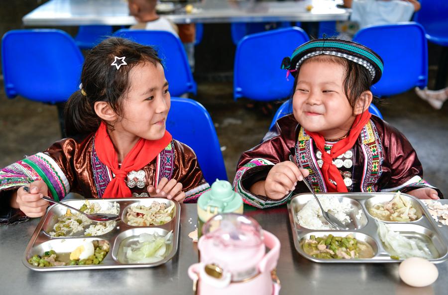 Teacher delivers hope to children in China's landlocked mountains