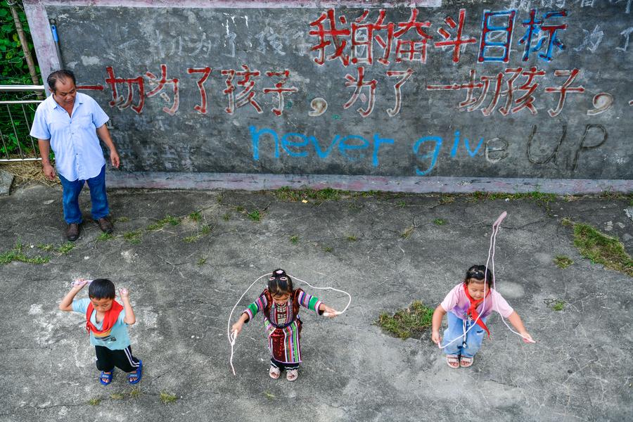 Teacher delivers hope to children in China's landlocked mountains