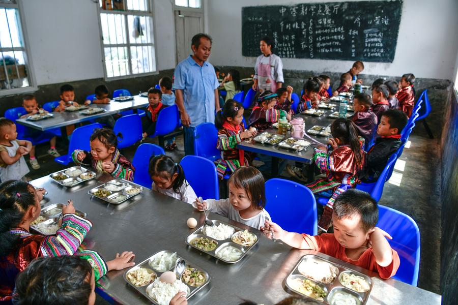 Teacher delivers hope to children in China's landlocked mountains