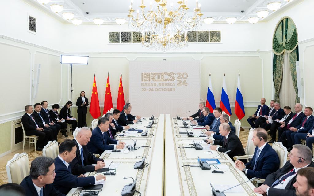 Xi says China, Russia find right way for neighboring major countries to get along with each other